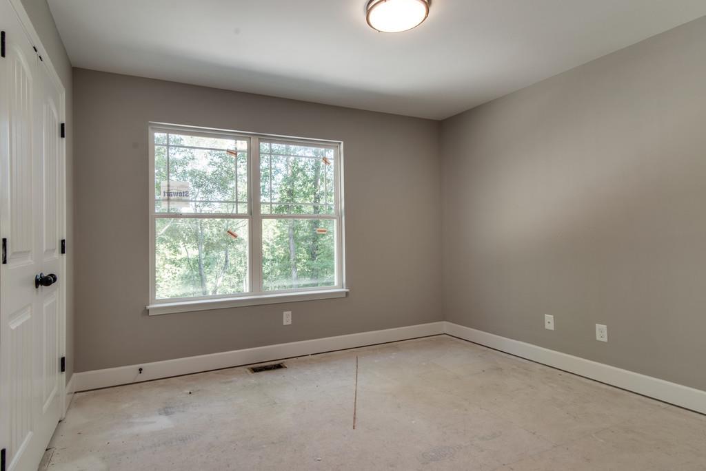 234 East Piney Road Dickson, TN 37055 - Photo 17 of 18 an empty room with a window