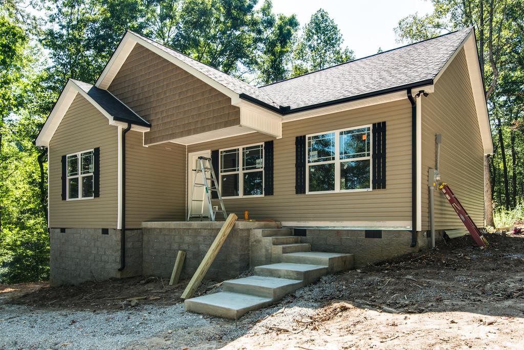 234 East Piney Road Dickson, TN 37055 - Photo 2 of 18 a view of a house with backyard