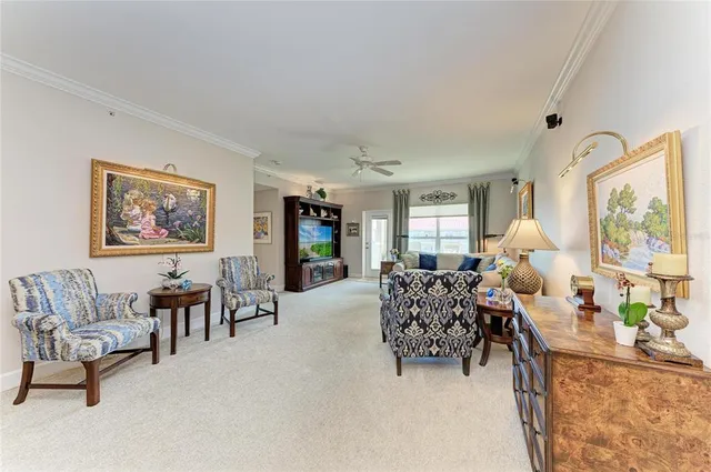 a bedroom with a bed a dresser and book shelf