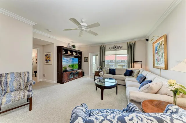 a view of a lake with a table and chairs