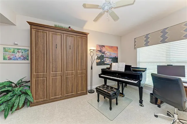 a view of a backyard with sitting area