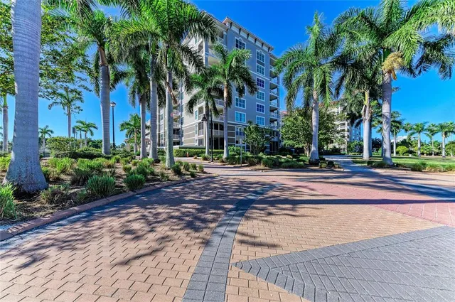 a view of living room with furniture and wooden floor