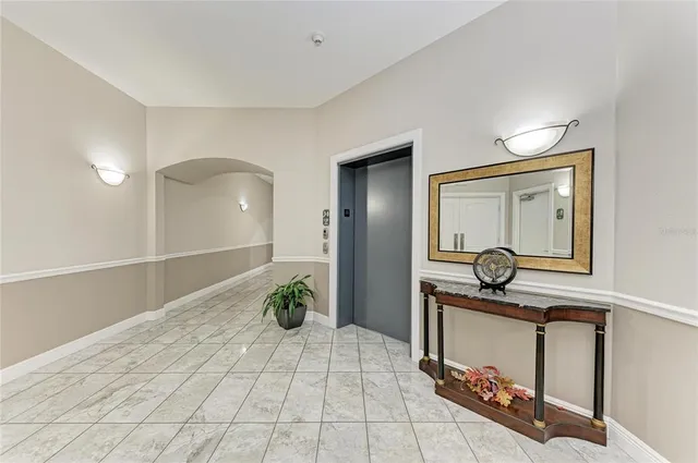 a kitchen with stainless steel appliances granite countertop a stove and a refrigerator