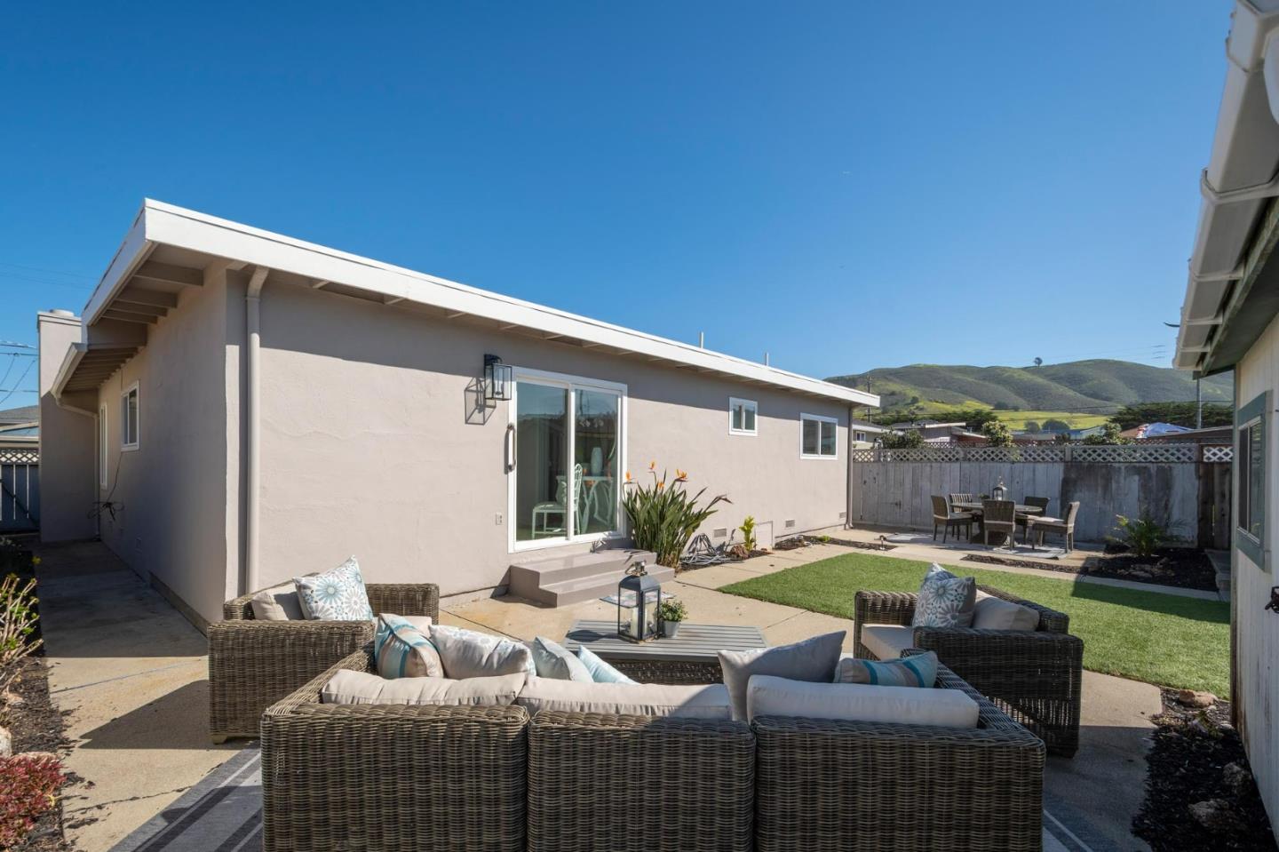 150 Surf Street Pacifica, CA 94044 - Photo 17 of 20 a view of an house with backyard and furniture