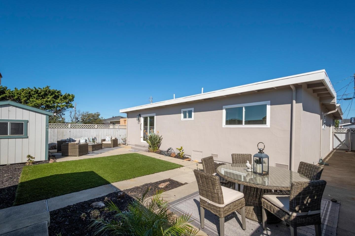 150 Surf Street Pacifica, CA 94044 - Photo 18 of 20 a view of a house with backyard and sitting area
