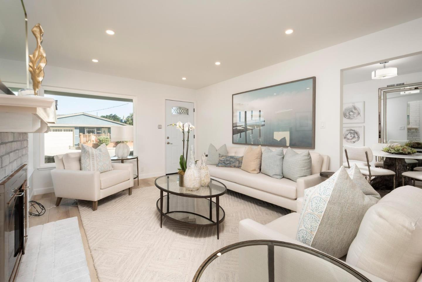 150 Surf Street Pacifica, CA 94044 - Photo 3 of 20 a living room with furniture and a large window