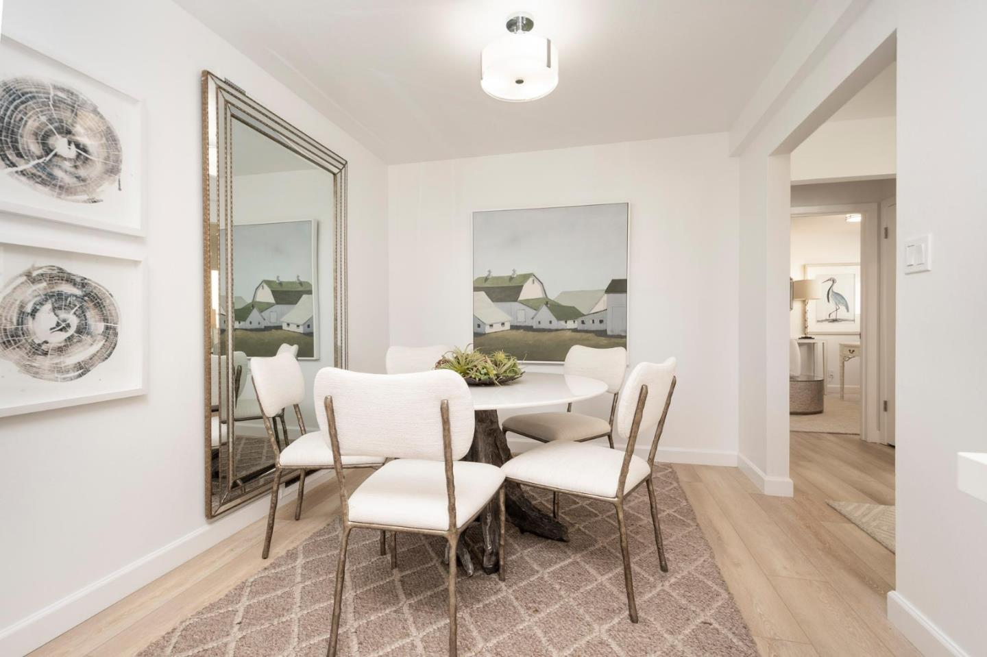 150 Surf Street Pacifica, CA 94044 - Photo 6 of 20 a dining room with furniture and wooden floor