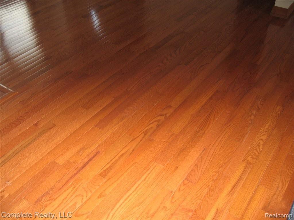 6305 Coldwater Road Flushing, MI 48433 - Photo 7 of 16 Beautiful wood flooring.JPG
