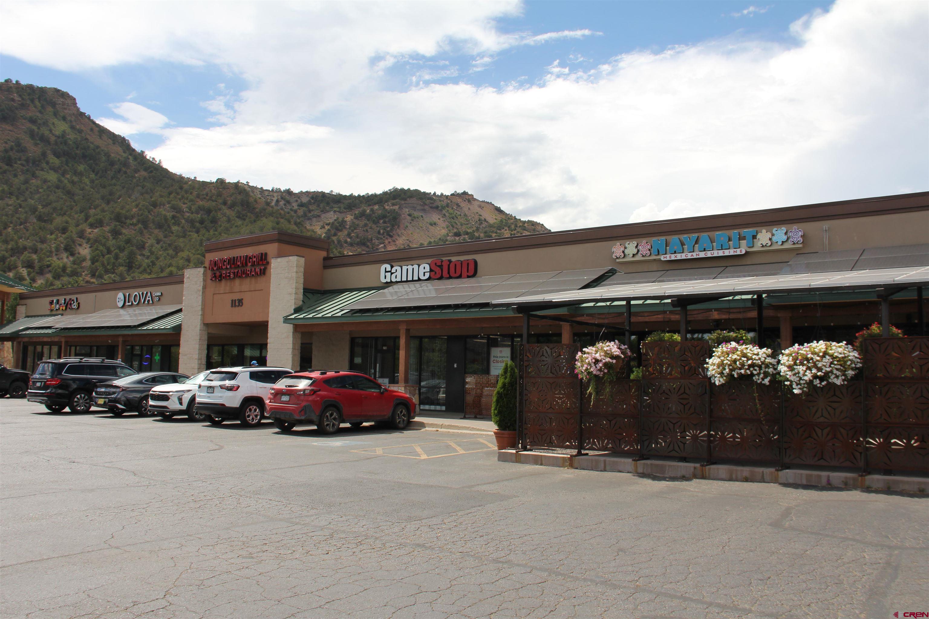 1135 South Camino Del Rio Durango, CO 81303 - Photo 2 of 4 a front view of building with cars parked