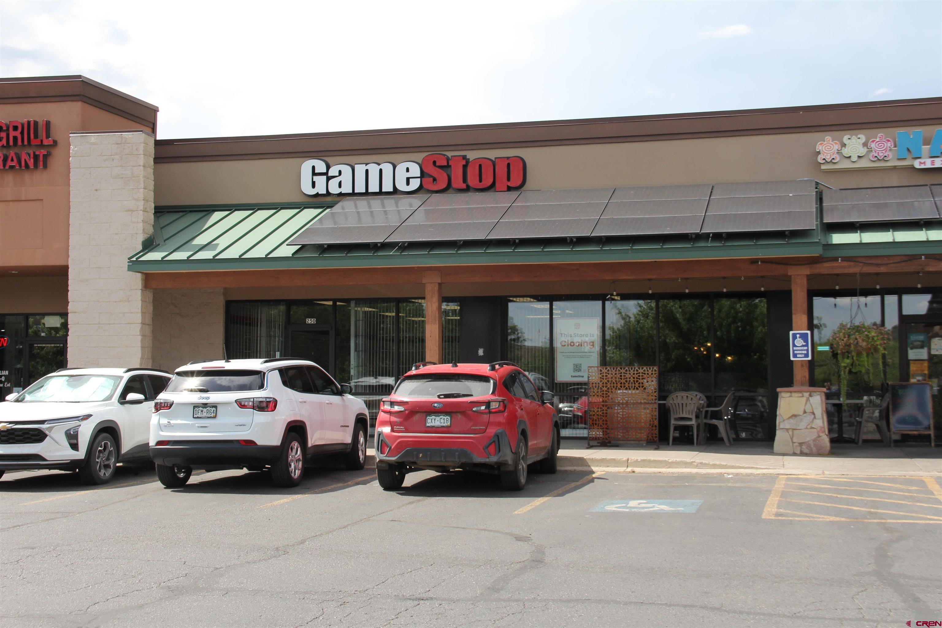 1135 South Camino Del Rio Durango, CO 81303 - Photo 3 of 4 a car parked in front of a building