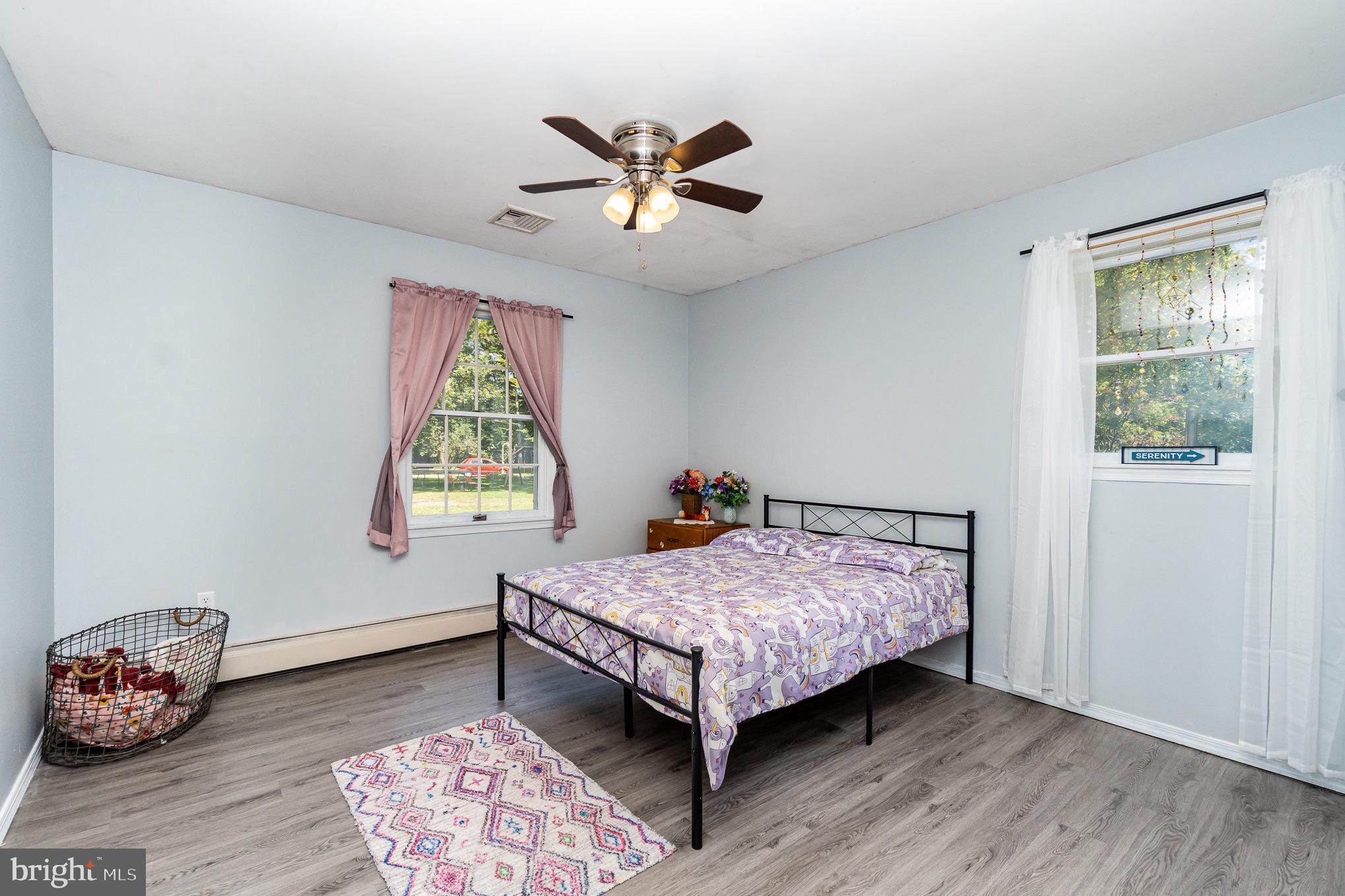 335 Apple Ridge Road Loysville, PA 17047 - Photo 18 of 46 a bedroom with a bed and a window