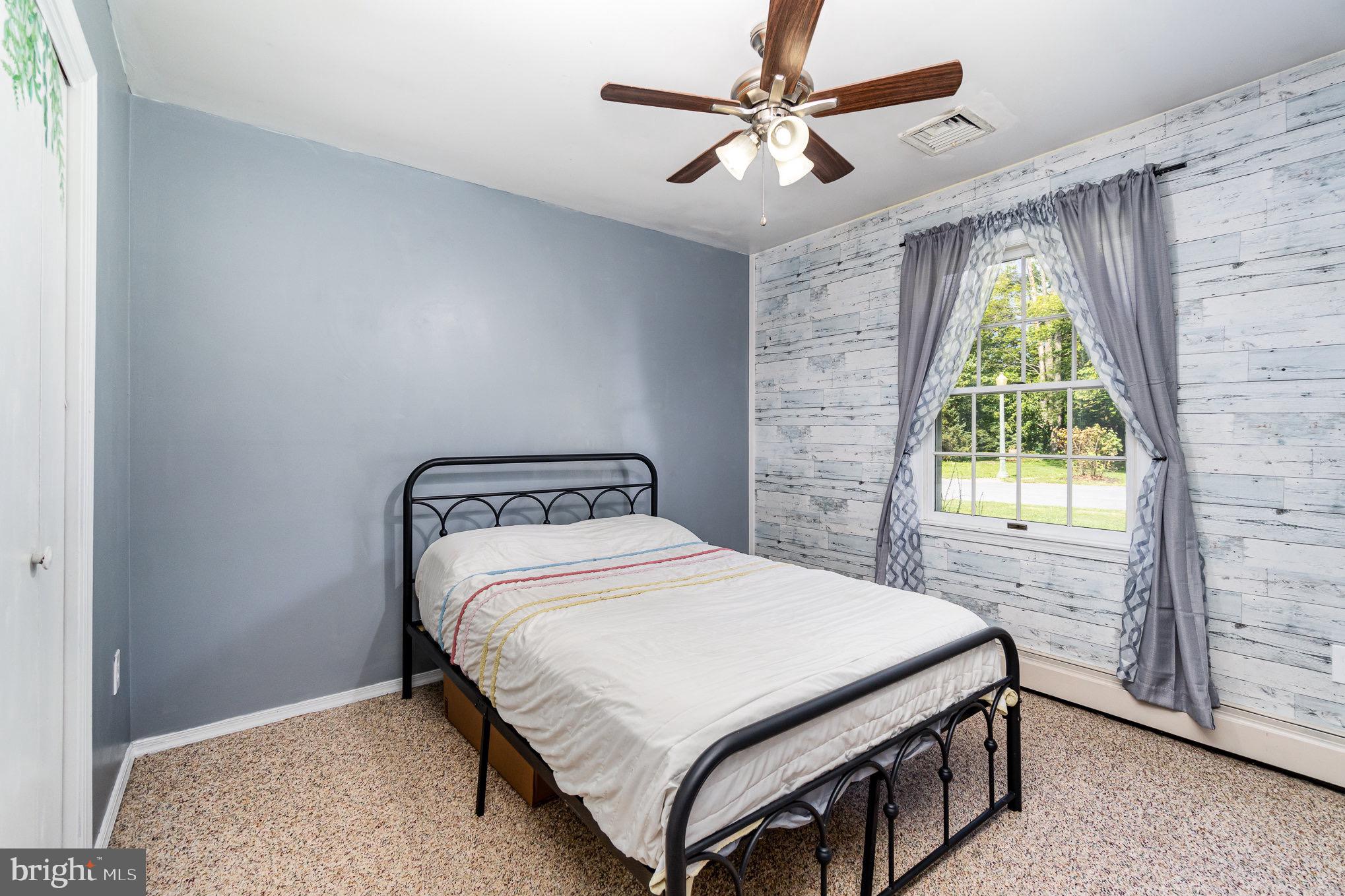 335 Apple Ridge Road Loysville, PA 17047 - Photo 20 of 46 a bedroom with a bed and a window