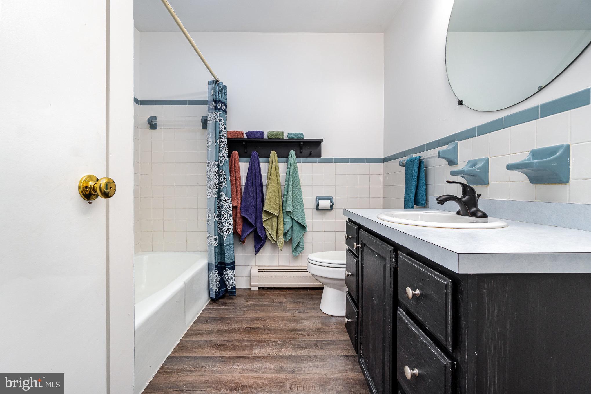 335 Apple Ridge Road Loysville, PA 17047 - Photo 22 of 46 a bathroom with a sink a toilet and shower