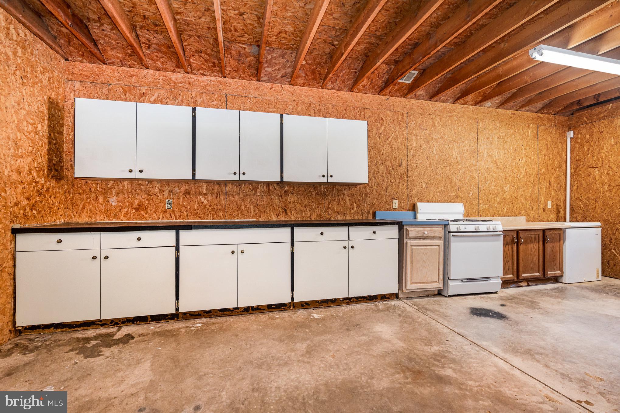 335 Apple Ridge Road Loysville, PA 17047 - Photo 25 of 46 a view of a kitchen with wooden cabinets