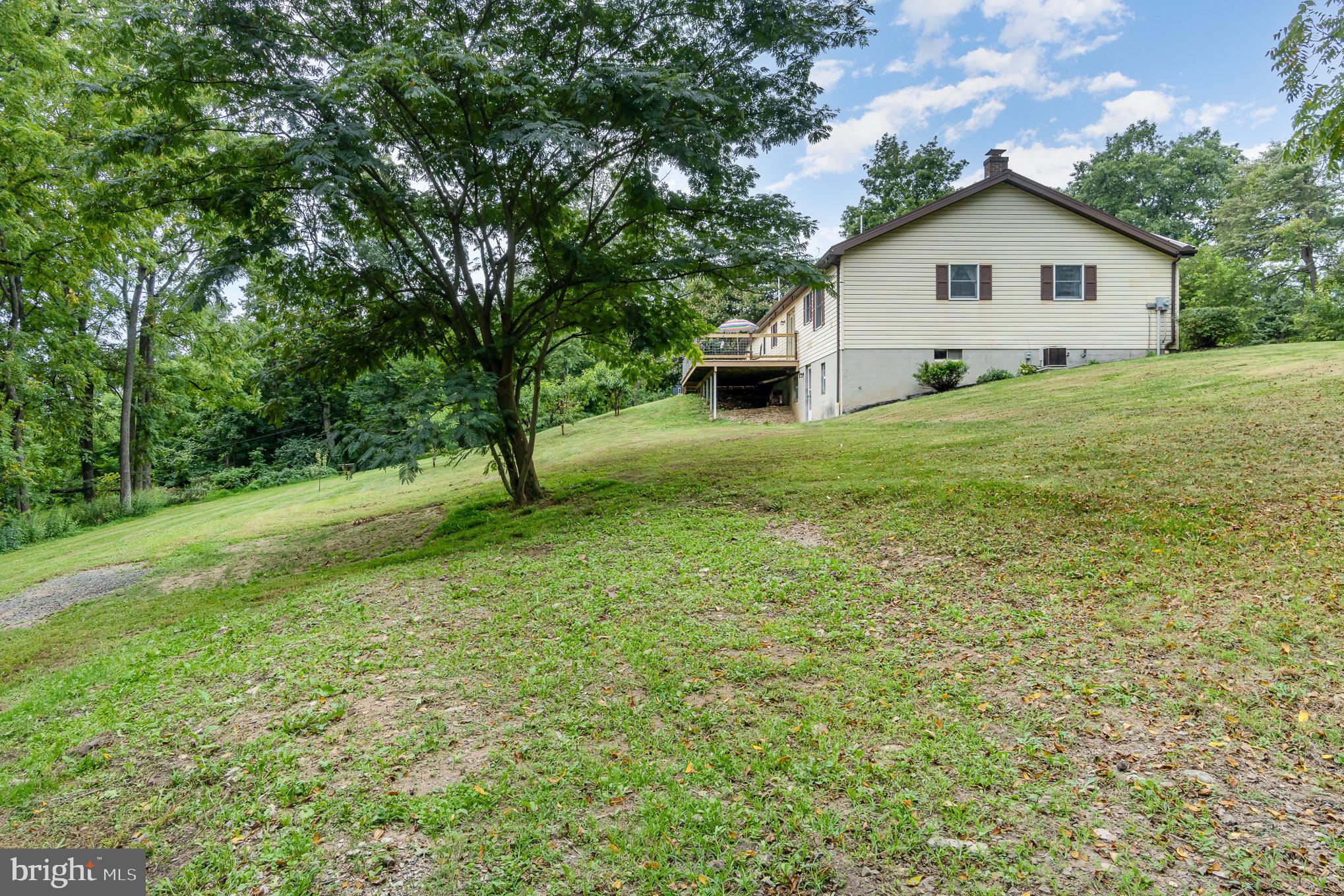 335 Apple Ridge Road Loysville, PA 17047 - Photo 34 of 46 a front view of a house with a yard