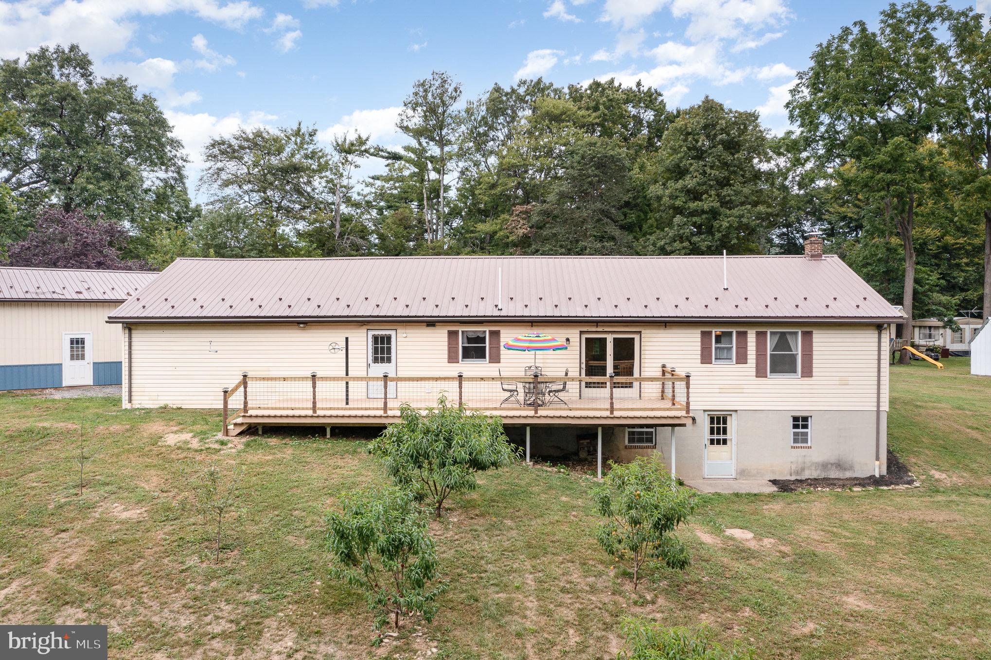 335 Apple Ridge Road Loysville, PA 17047 - Photo 42 of 46 a front view of a house with a yard and garage