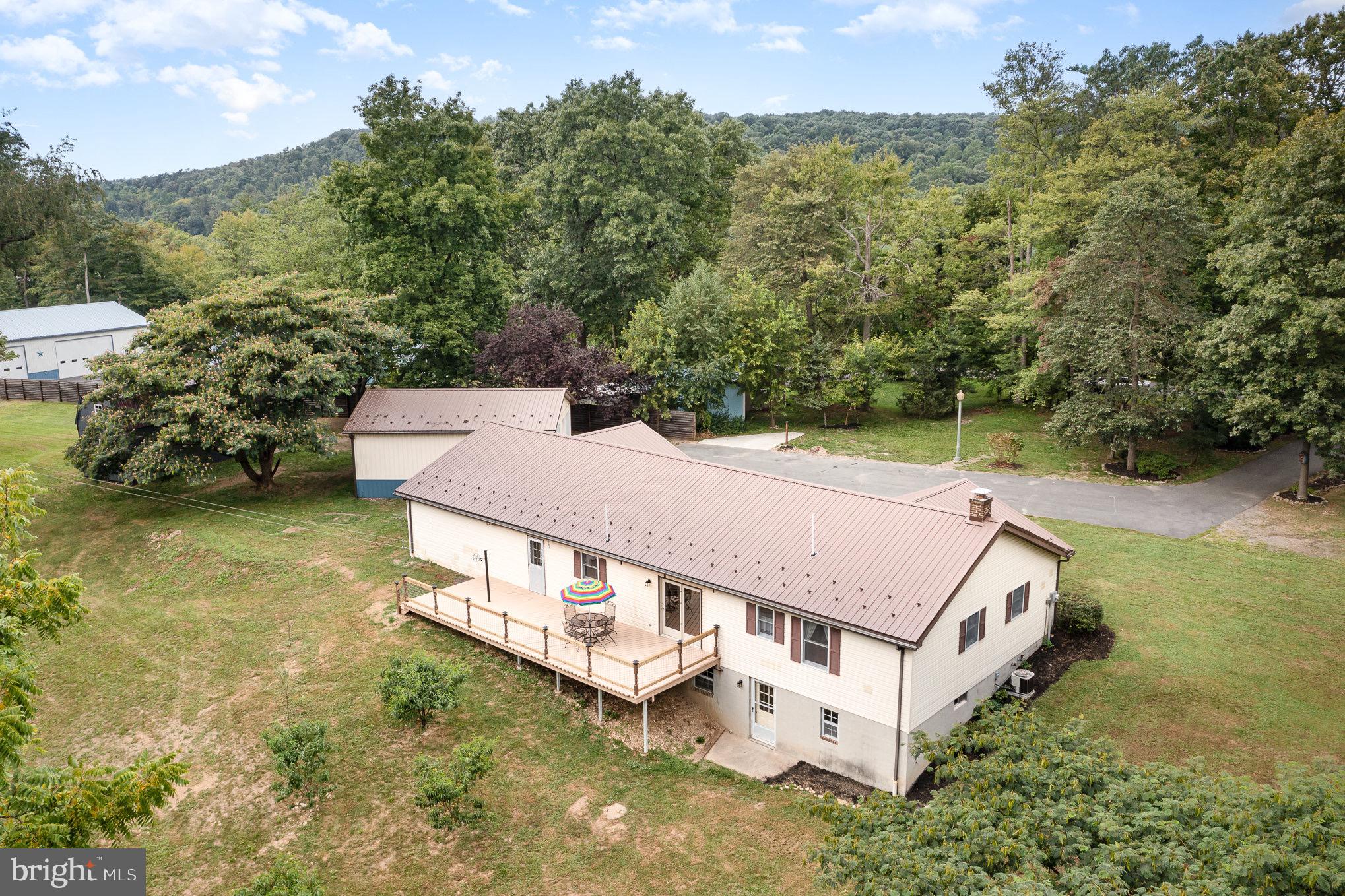 335 Apple Ridge Road Loysville, PA 17047 - Photo 43 of 46 an aerial view of a house with a yard