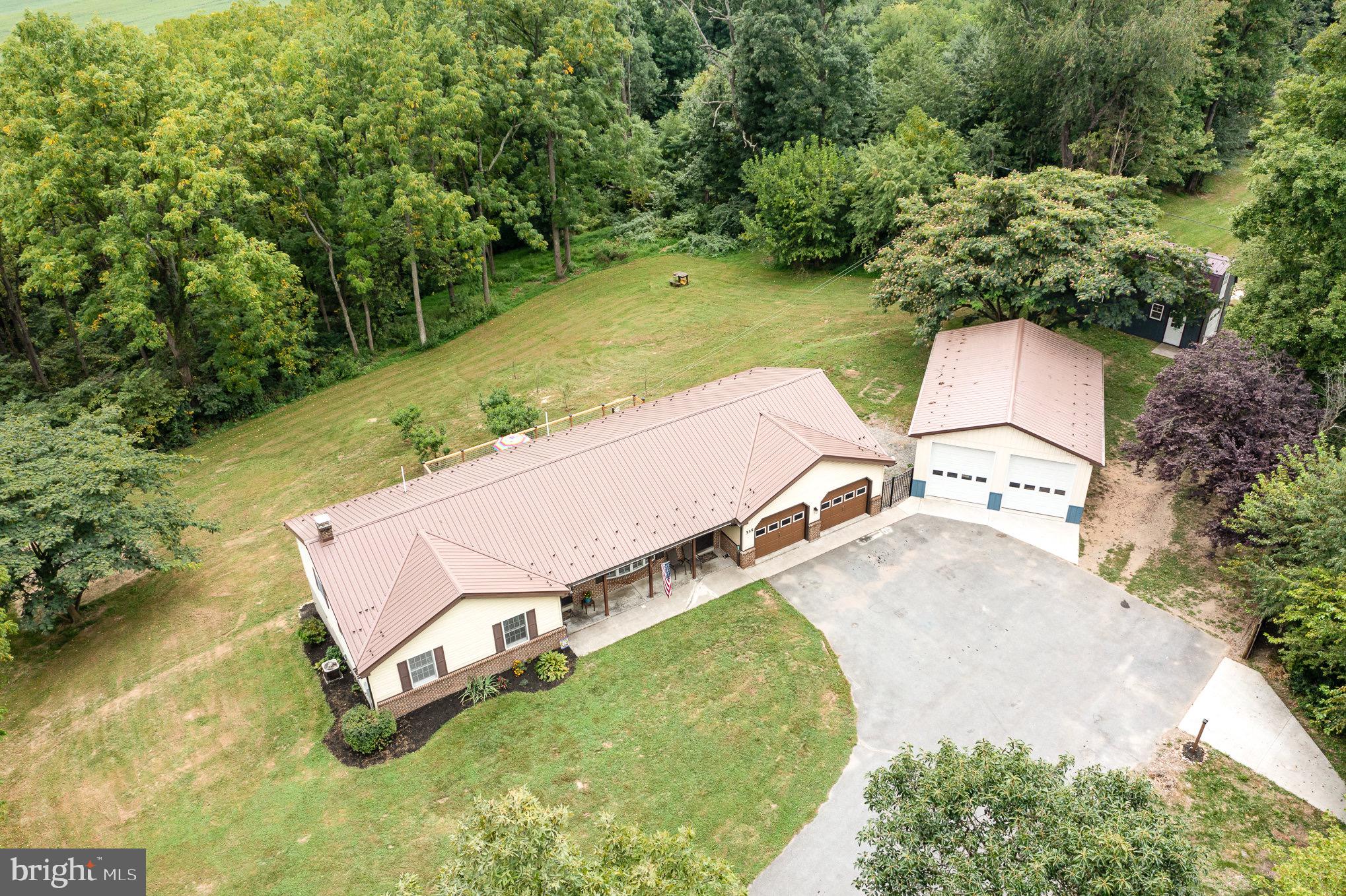 335 Apple Ridge Road Loysville, PA 17047 - Photo 5 of 46 an aerial view of a pool with a yard