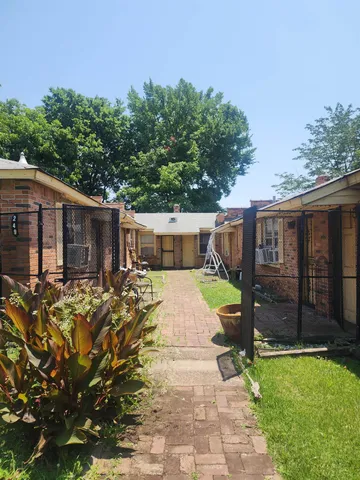 a view of a back yard of the house