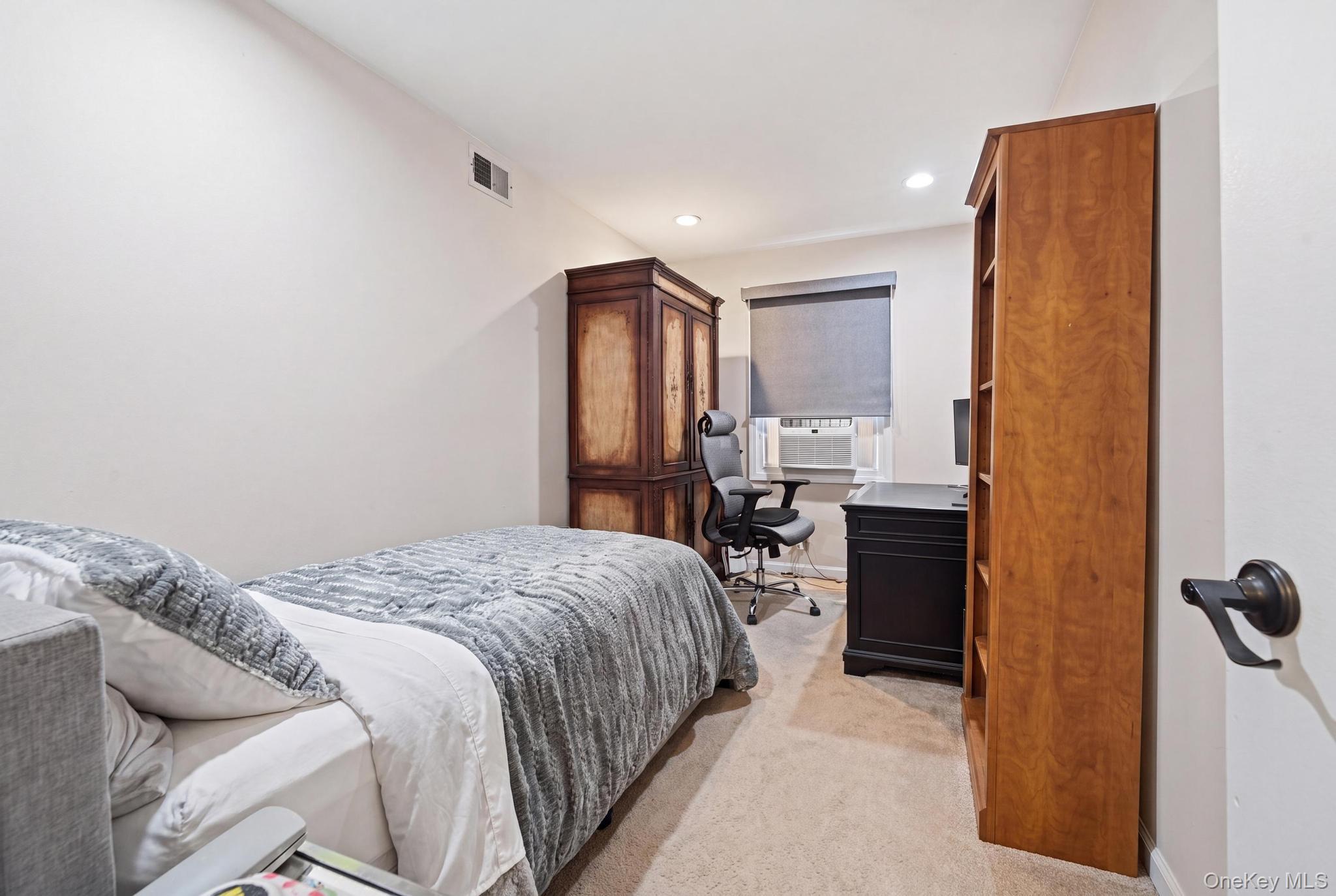 19 Sunset Road West Albertson, NY 11507 - Photo 11 of 24 A versatile first-floor bonus room offers the perfect space for a private home office, guest bedroom, or flex room to suit your lifestyle.