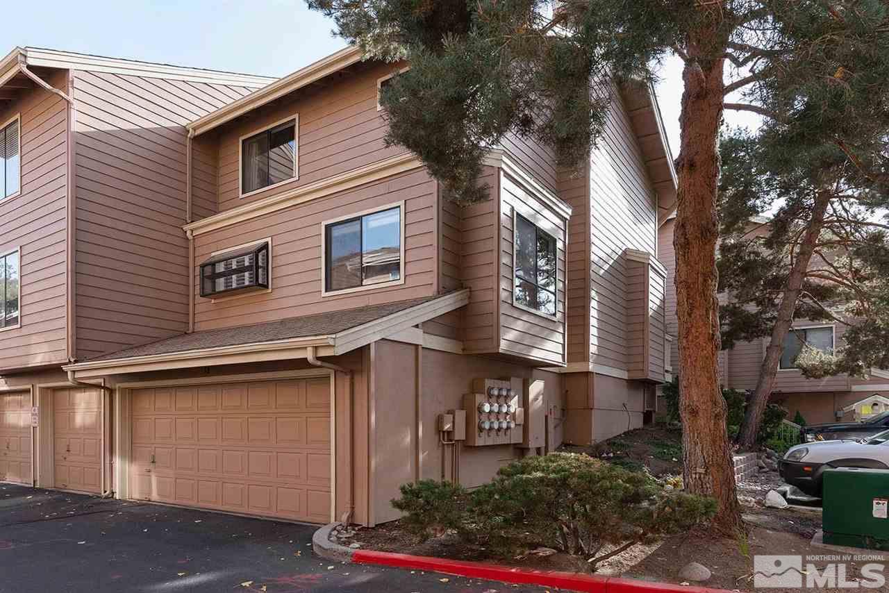 2875 Idlewild Drive, Unit 58 Reno, NV 89509 - Photo 22 of 25 a street sign on a pole on a street