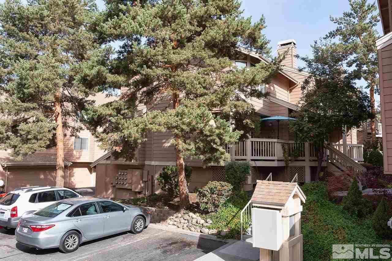 2875 Idlewild Drive, Unit 58 Reno, NV 89509 - Photo 23 of 25 a car parked in front of a house