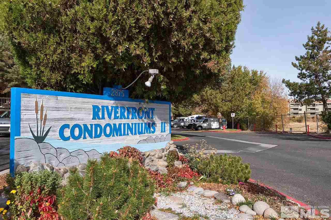 2875 Idlewild Drive, Unit 58 Reno, NV 89509 - Photo 24 of 25 a sign on the side of a road