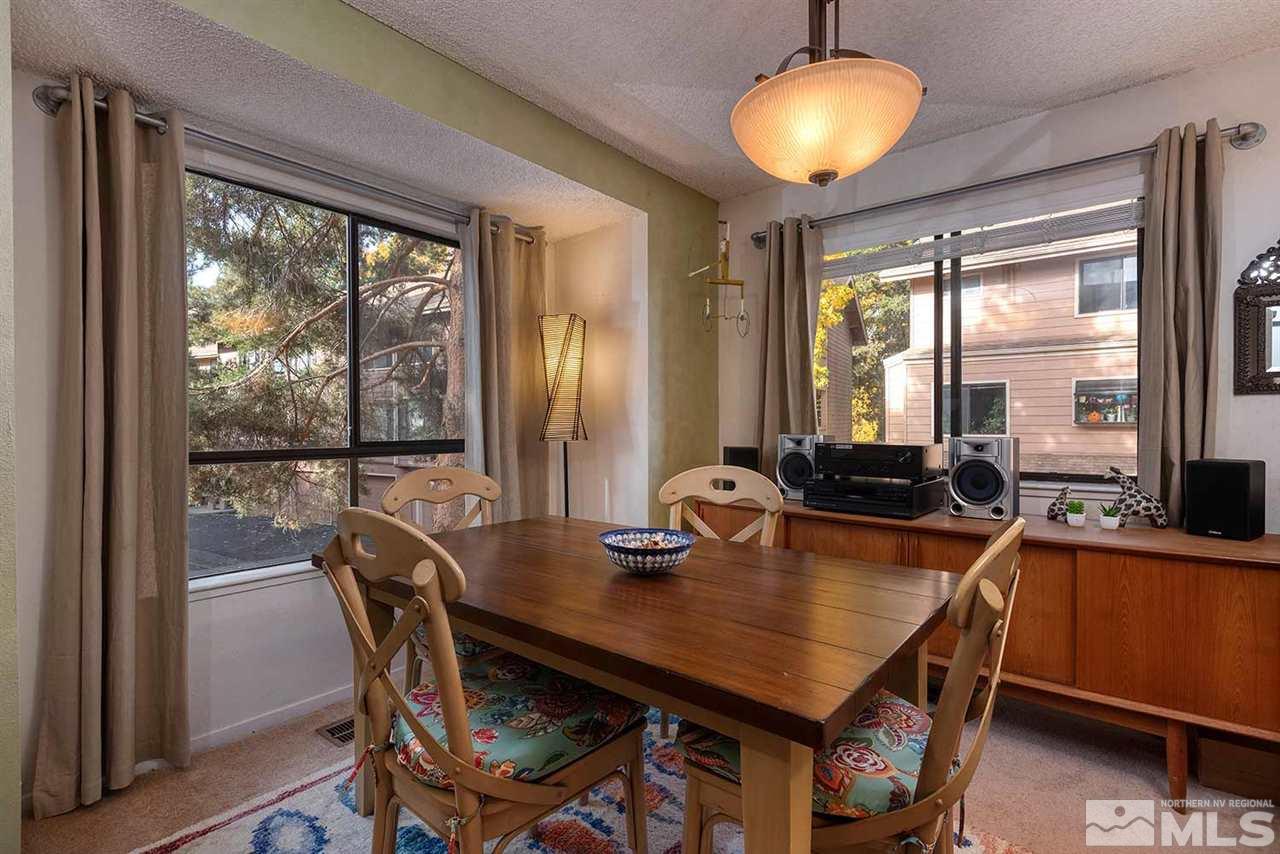 2875 Idlewild Drive, Unit 58 Reno, NV 89509 - Photo 6 of 25 a view of a dining room with furniture and window