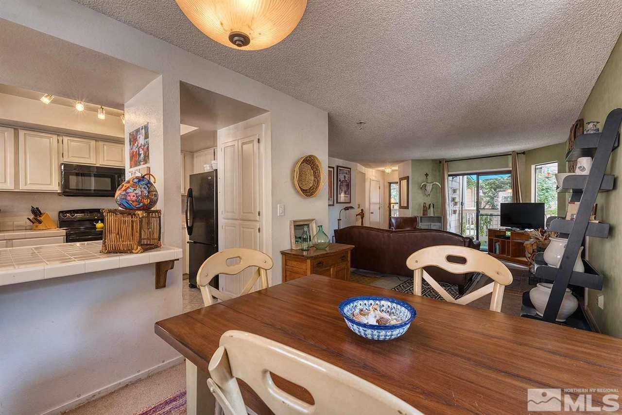 2875 Idlewild Drive, Unit 58 Reno, NV 89509 - Photo 7 of 25 a living room with furniture and a wooden floor