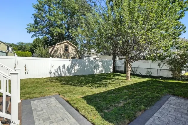 a view of a yard in front of a house