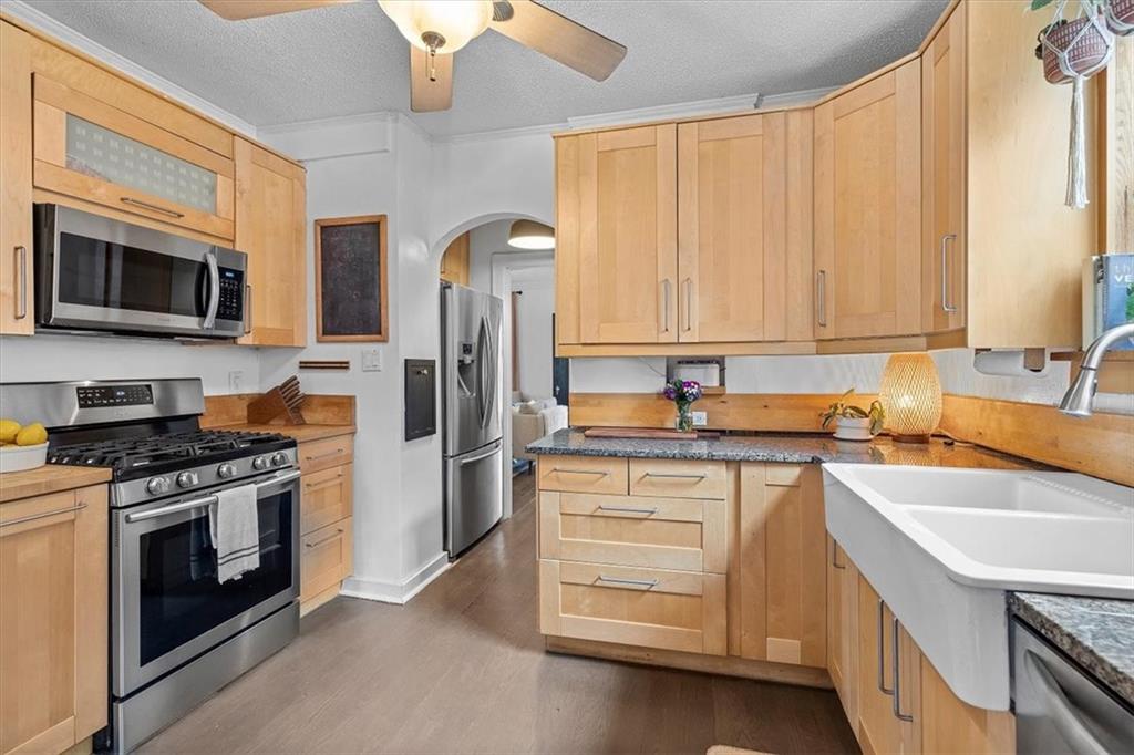 215 Elm Road Ambridge, PA 15003 - Photo 13 of 25 a kitchen with a stove oven and a sink