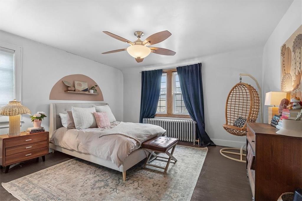 215 Elm Road Ambridge, PA 15003 - Photo 18 of 25 a bedroom with a bed window and couch