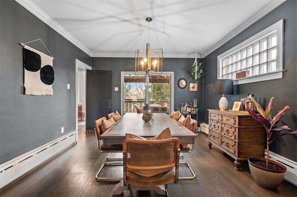 215 Elm Road Ambridge, PA 15003 - Photo 9 of 25 a living room with furniture and a chandelier