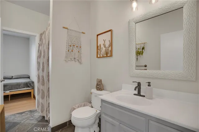 a bathroom with a sink and a toilet