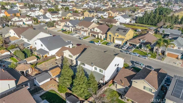 an aerial view of residential house with outdoor space