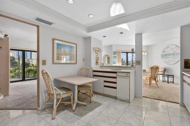 a view of a swimming pool with outdoor seating space