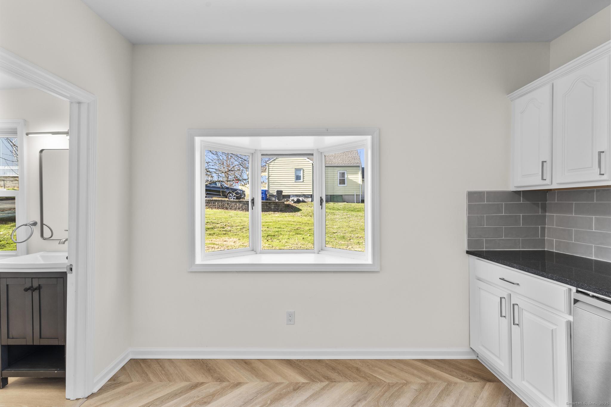 4 Bellview Road Branford, CT 06405 - Photo 12 of 30 a view of an empty room with a window