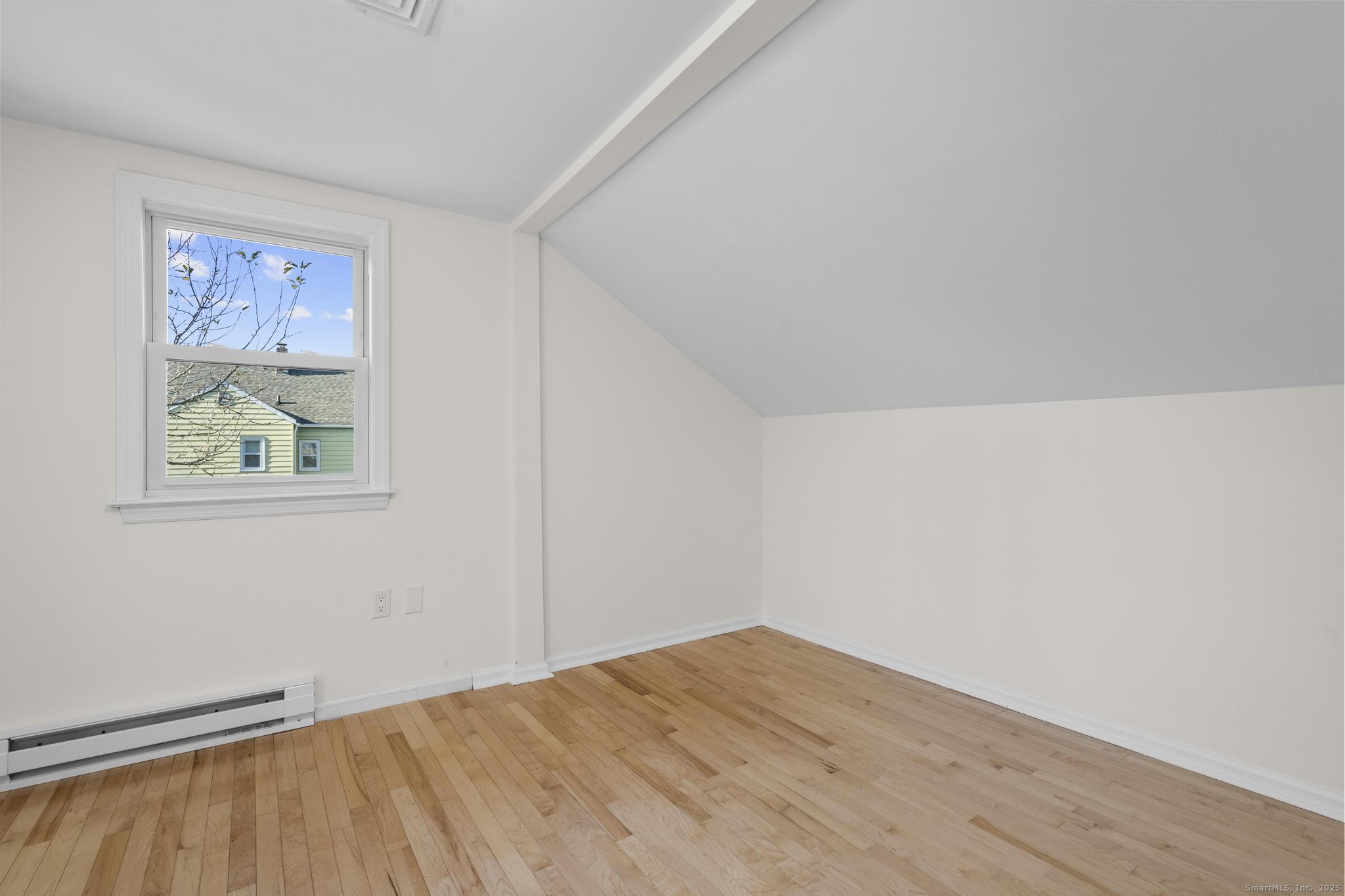 4 Bellview Road Branford, CT 06405 - Photo 23 of 30 a view of empty room with wooden floor and fan