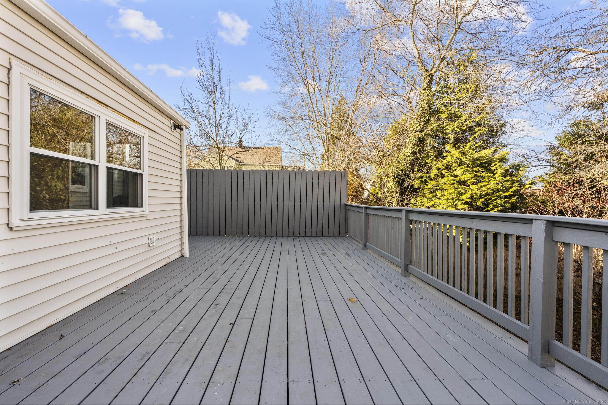 4 Bellview Road Branford, CT 06405 - Photo 25 of 30 a view of a house with a deck