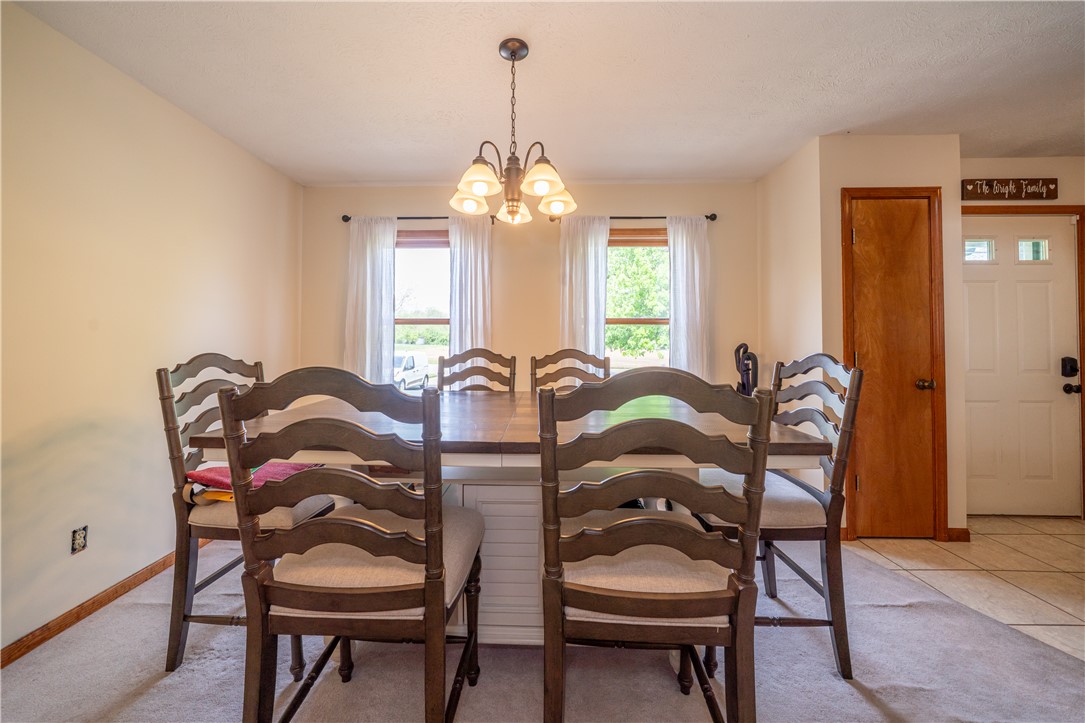 3628 Petre Road Springfield, OH 45502 - Photo 15 of 52 This dining area offers a warm and inviting atmosphere for shared meals and gatherings.