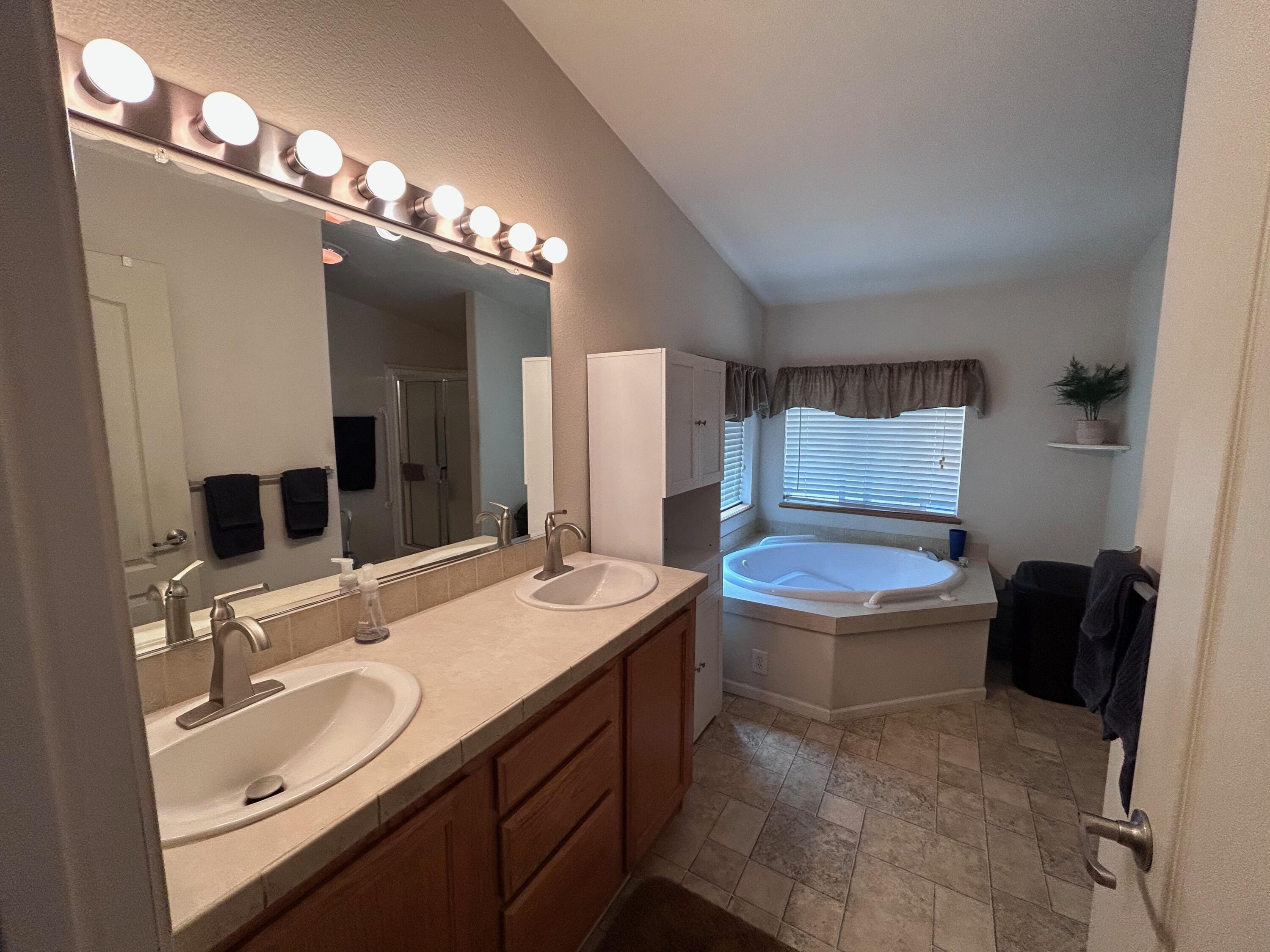 7150 Kaysie Rae Court Shingletown, CA 96088 - Photo 13 of 34 a bathroom with a sink double vanity and a mirror
