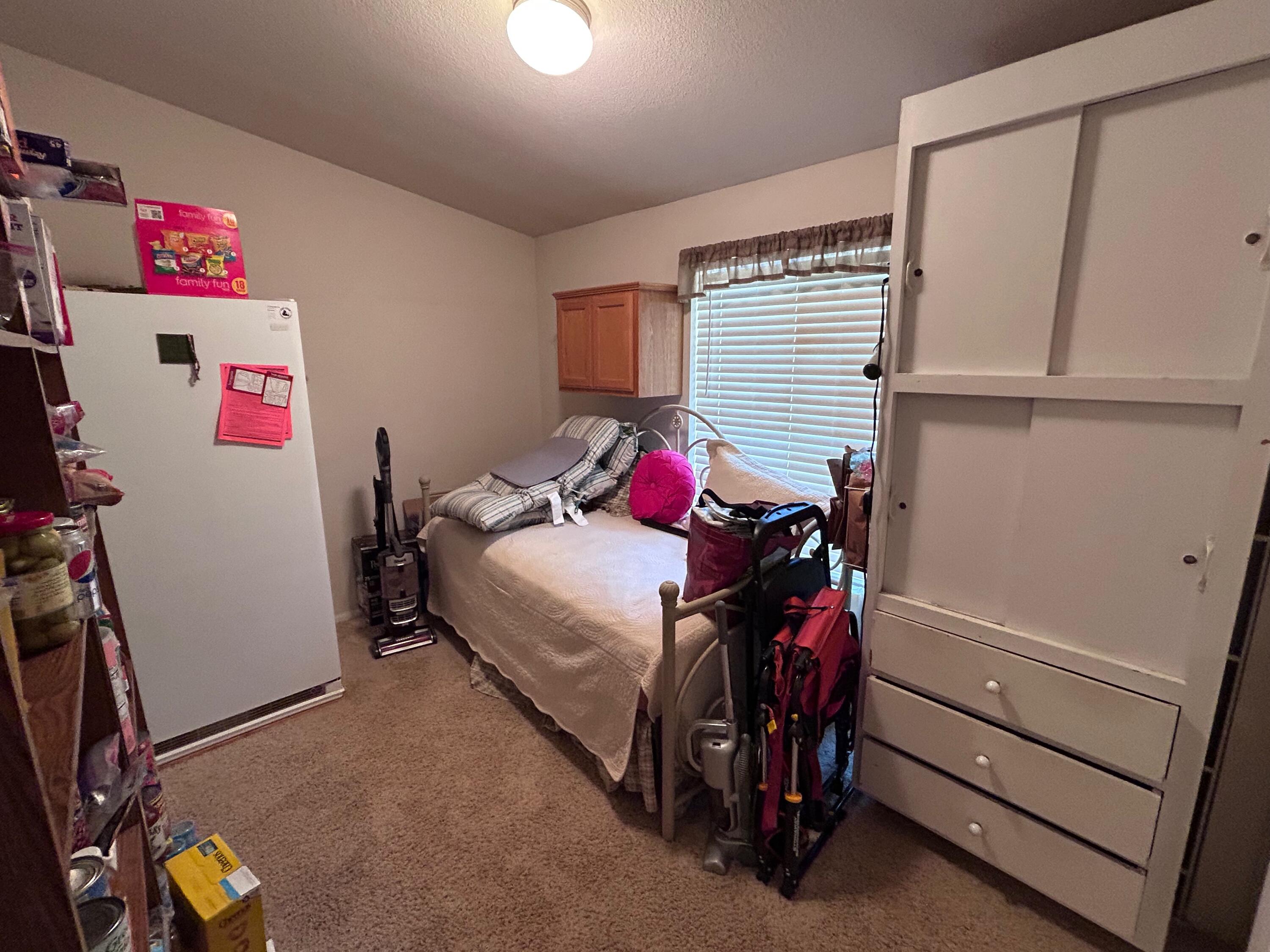 7150 Kaysie Rae Court Shingletown, CA 96088 - Photo 16 of 34 a bedroom with a bed and a window