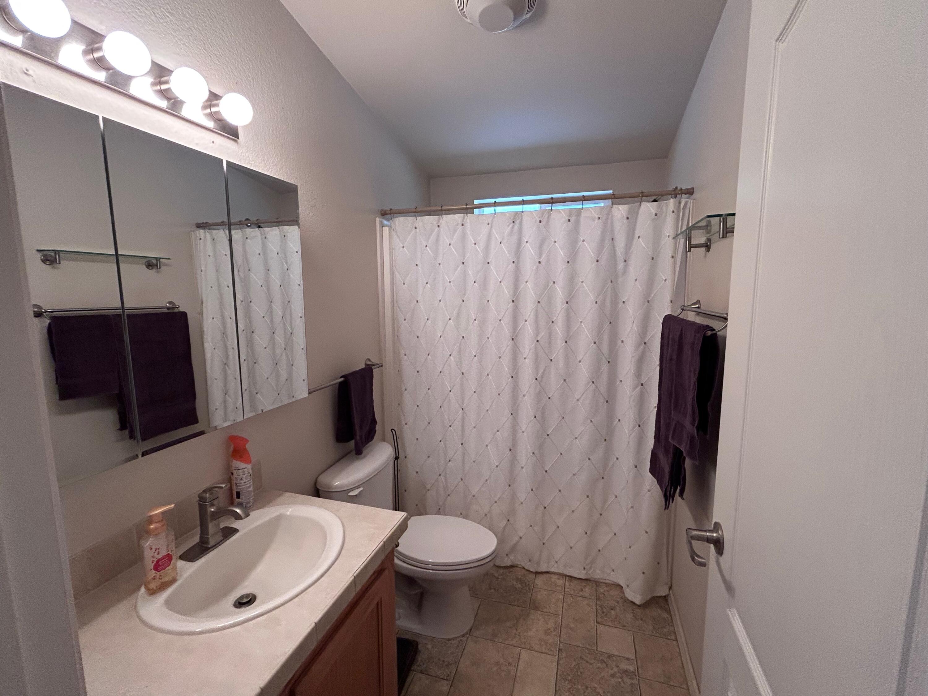 7150 Kaysie Rae Court Shingletown, CA 96088 - Photo 17 of 34 a bathroom with a sink toilet and shower
