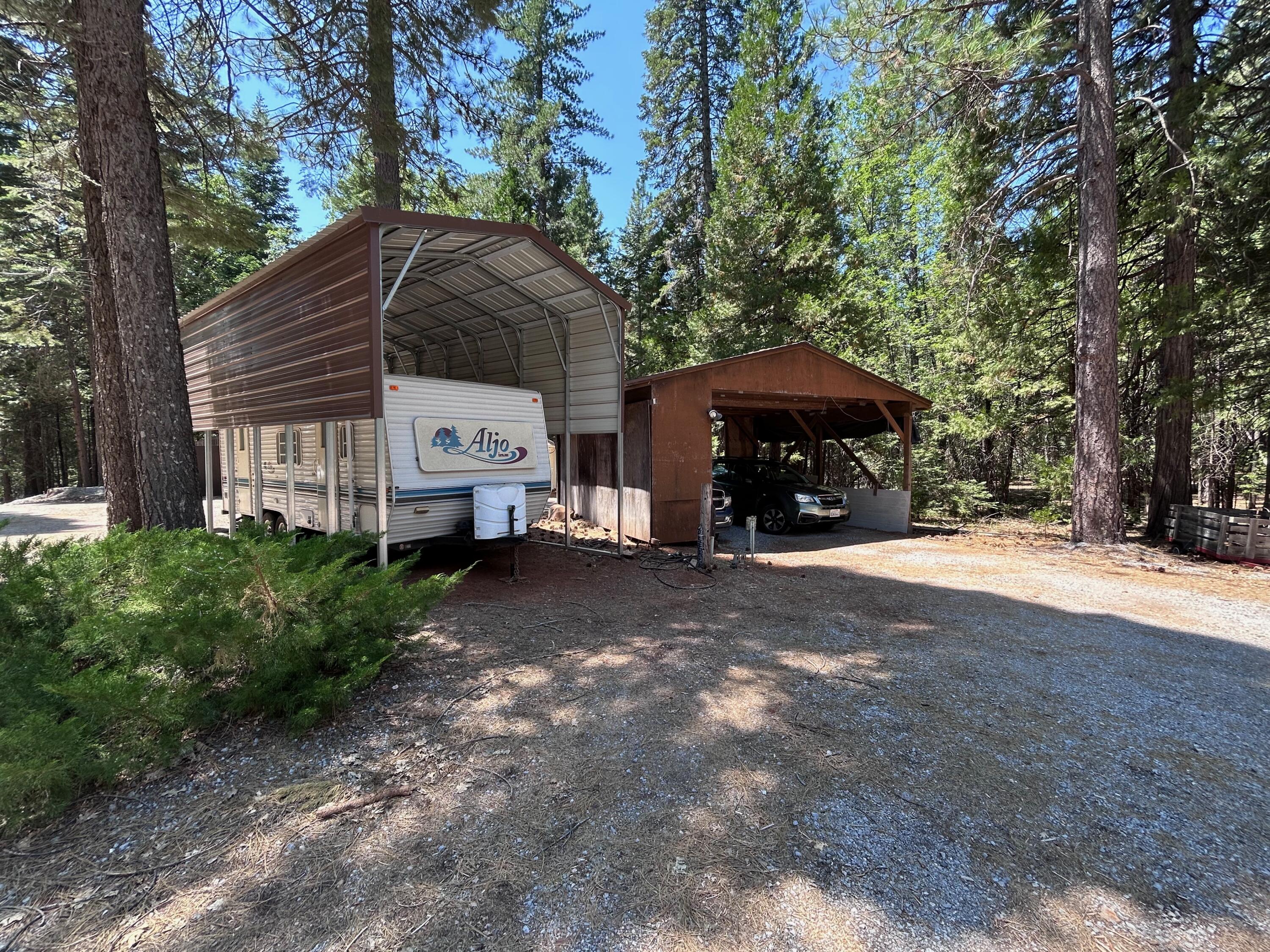 7150 Kaysie Rae Court Shingletown, CA 96088 - Photo 31 of 34 a front view of a house with a yard
