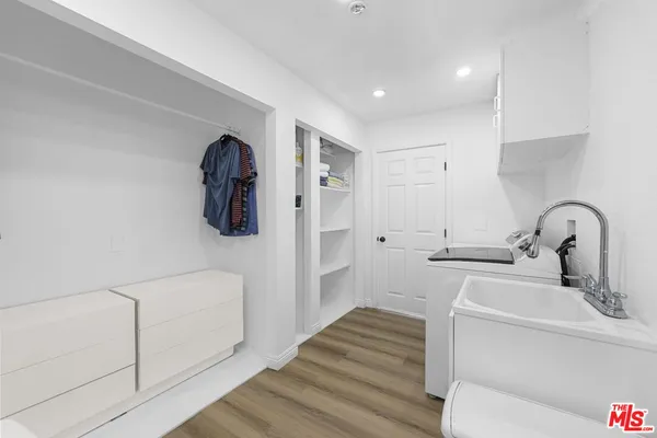 a bathroom with a sink and mirror