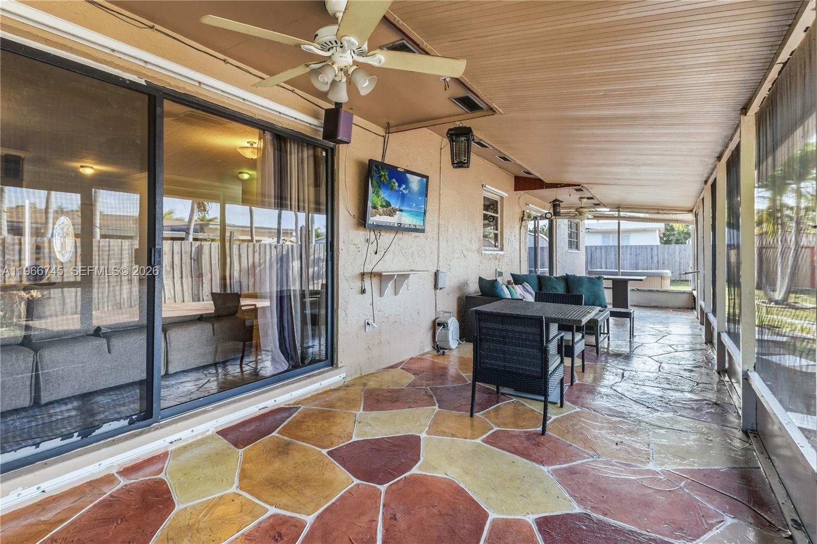 11753 Southwest 197th Street Miami, FL 33177 - Photo 16 of 36 a living room with a rug