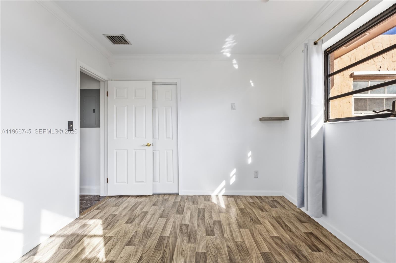 11753 Southwest 197th Street Miami, FL 33177 - Photo 24 of 36 a view of an empty room and window