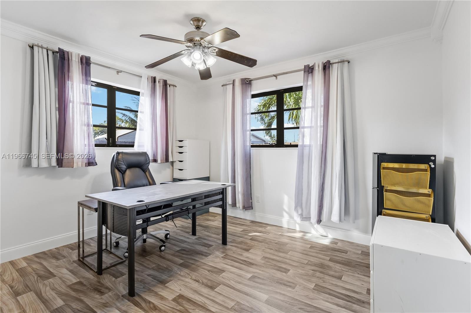 11753 Southwest 197th Street Miami, FL 33177 - Photo 28 of 36 a workspace with wooden floor