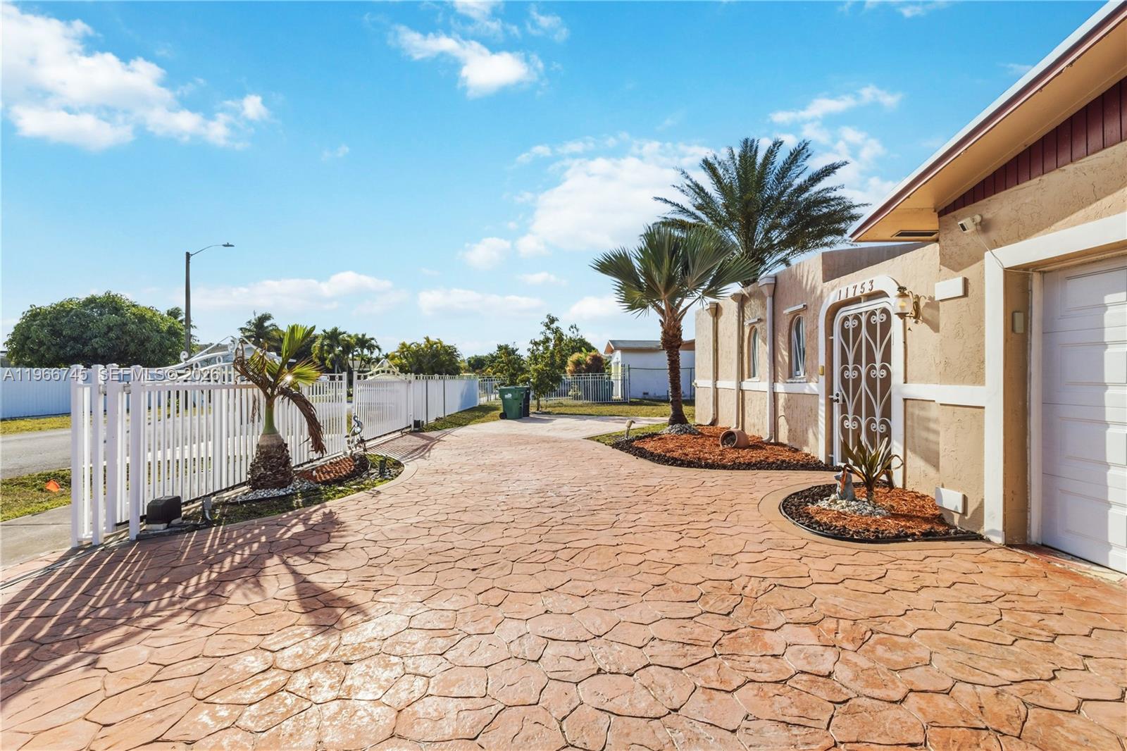 11753 Southwest 197th Street Miami, FL 33177 - Photo 31 of 36 a view of a terrace with chairs