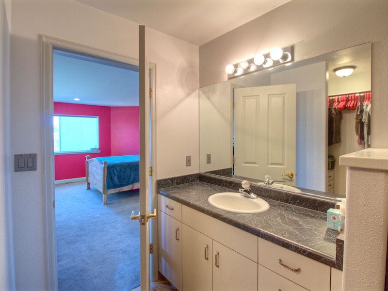 2550 I Road Grand Junction, CO 81505 - Photo 17 of 34 a en suite bathroom with a sink double vanity and a mirror